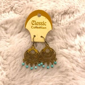 bronze-colored bohemian style earrings with turquoise beads. Super cute!